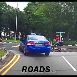 Foodpada delivery rider unhappy with taxi honking at him.