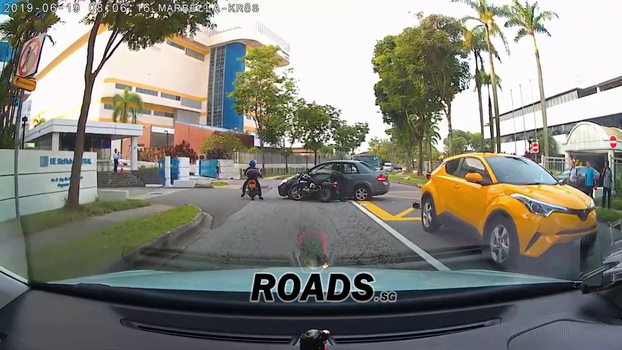 Unknown: Biker crashes into car.