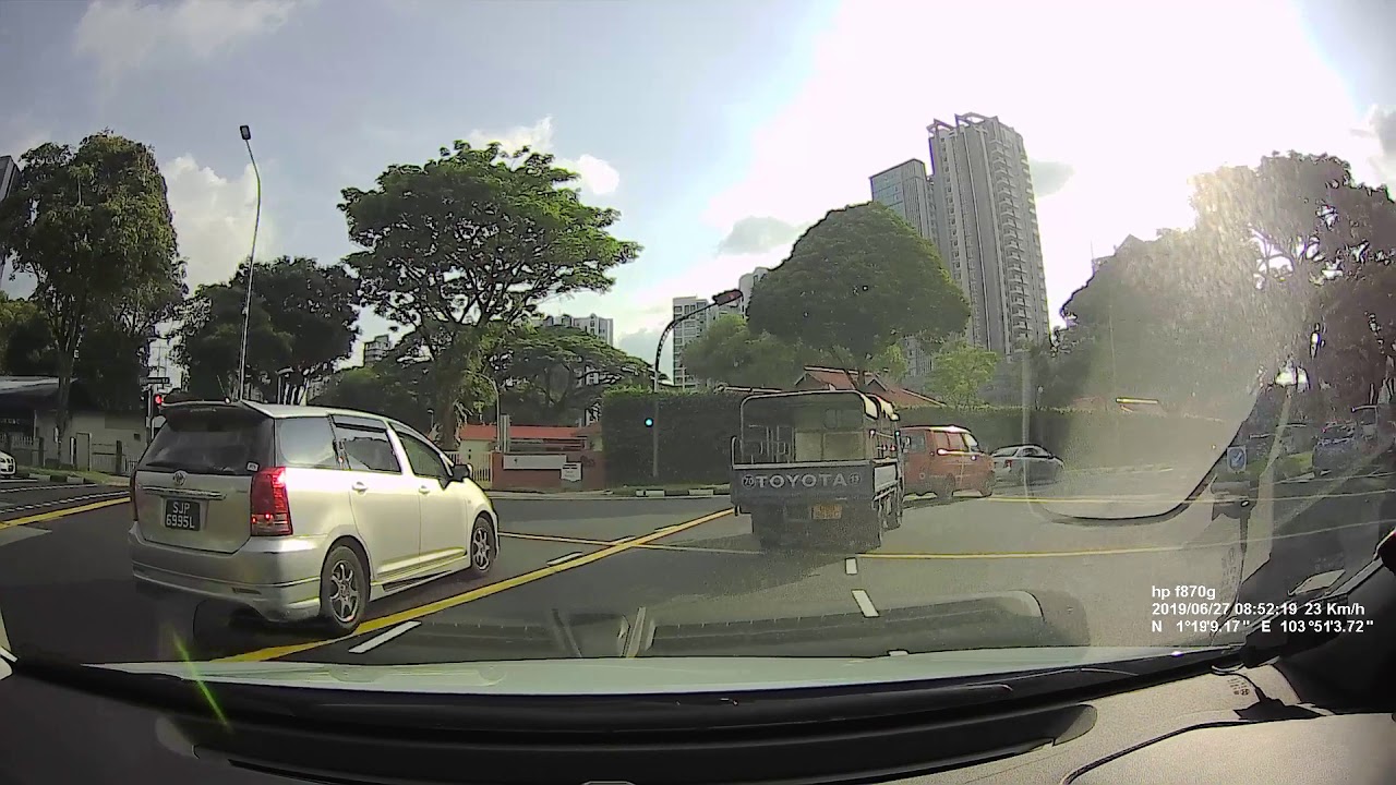 SJP6995L: Young Lady Driver swung into my lane during a turn, nearly causing accident