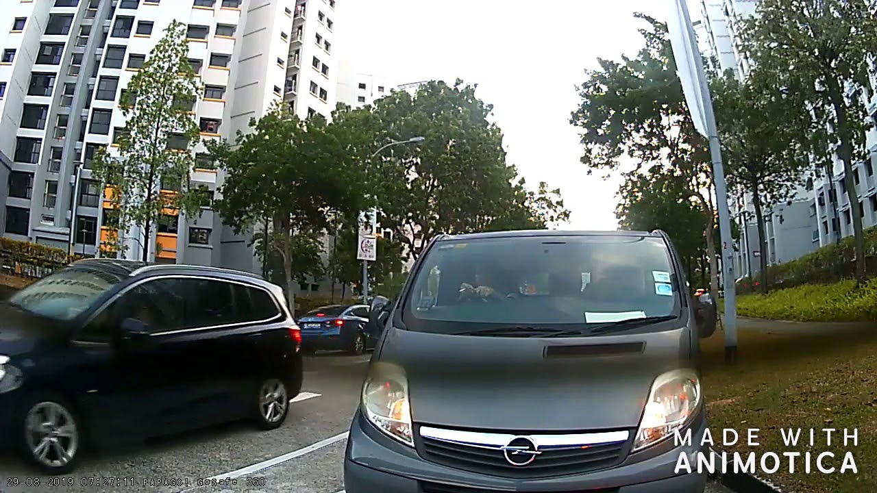 SLM2933J Inpatient driver trying to squeeze through at zebra crossing