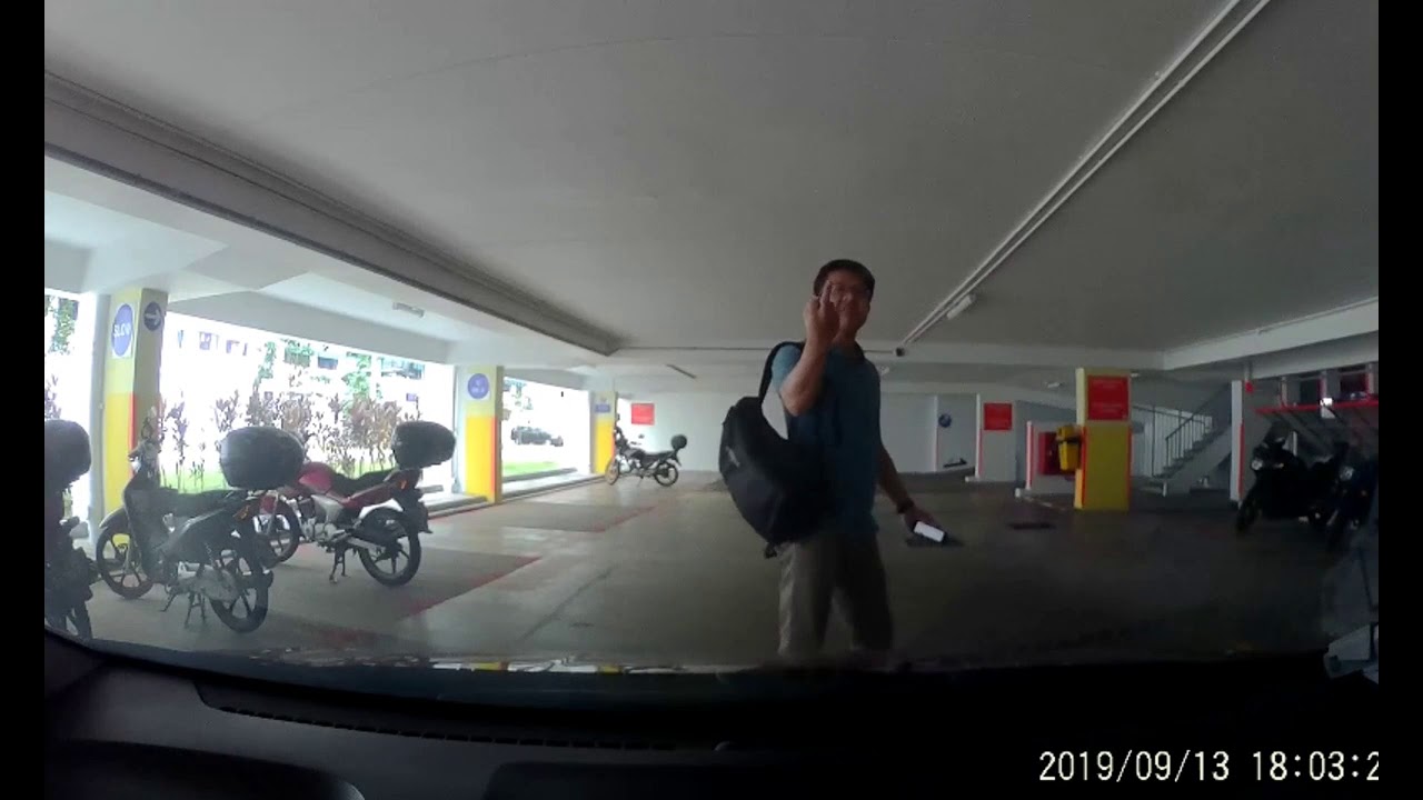 Man points middle finger and spews vulgarities.