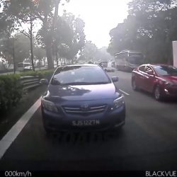 Abrupt cutting in of white car leading to motorcycle hitting rear of another car