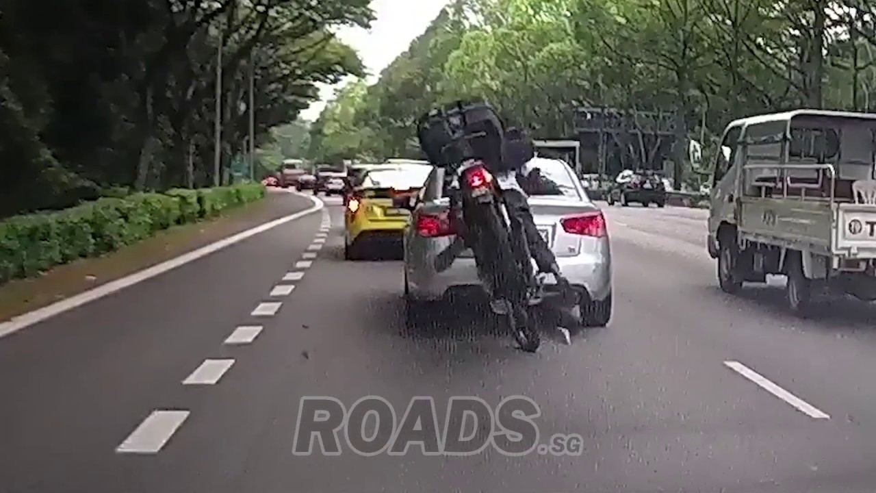 Malaysia registered motorcycle rear ended KIA Cerato Forte