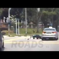 Accident at woodlands involving Taxi and Motorcycle