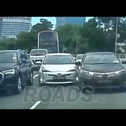 White Prius did not check blindspot while turning out and hit Brown Toyota Altis