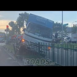 Lorry going up the divider along Hougang Ave 5