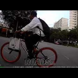 Cam-Car narrowly avoids hitting cyclist who disregarded traffic light