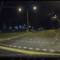 Jogger wearing dark clothes dashed across junction and had a close shave with cam-car