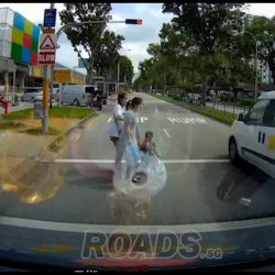 Van beats red light; close shave with baby in stroller at Boon Lay place