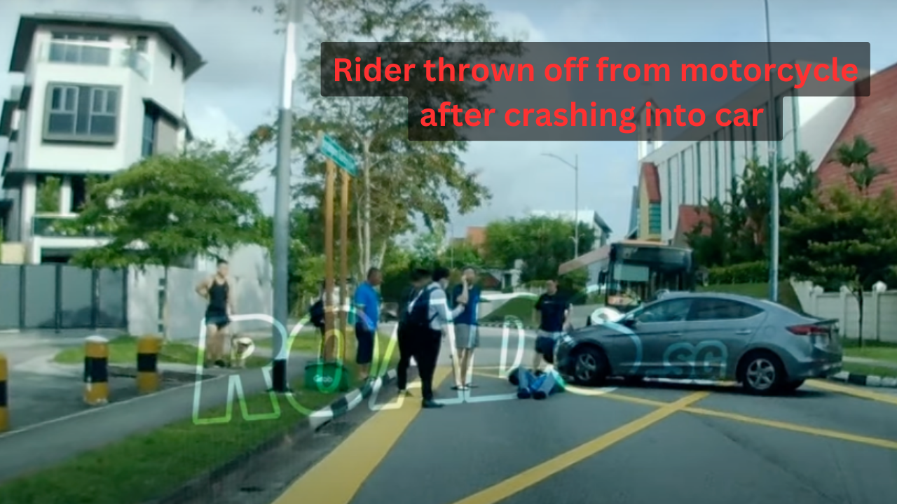 Rider thrown off from motorcycle after crashing into car